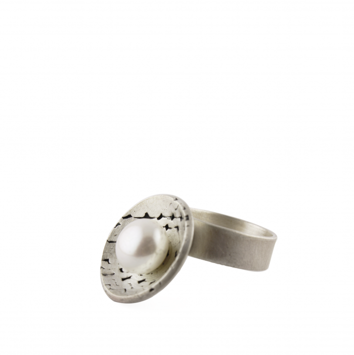 Silver ring with white pearl